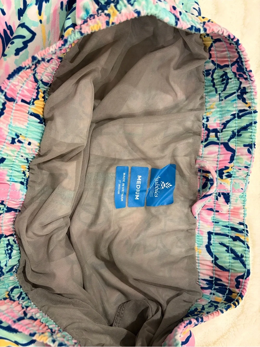 chubbies 7” Pastel Floral Swim Trunks in Pink, Aqua & Navy